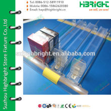 Shelf divider pusher and rail with price tag